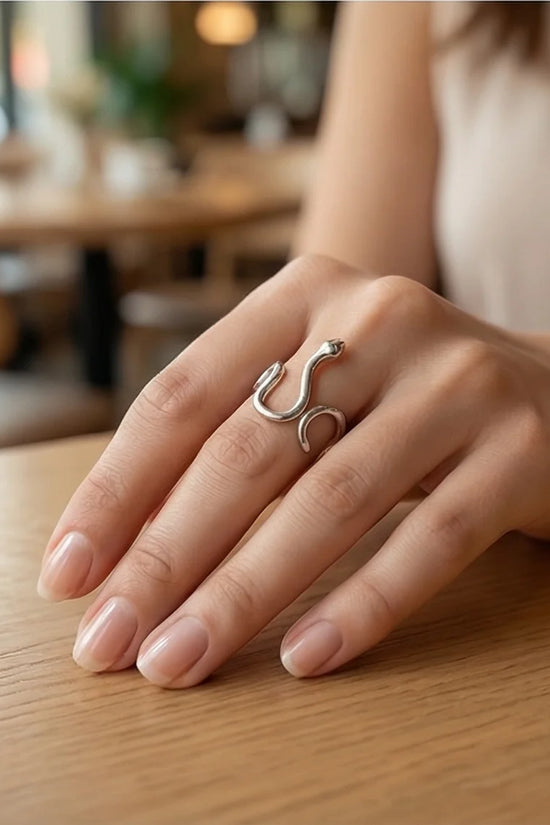 Silver Coil: Sleek Sculptural Serpentine Ring