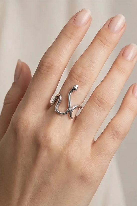Silver Coil: Sleek Sculptural Serpentine Ring