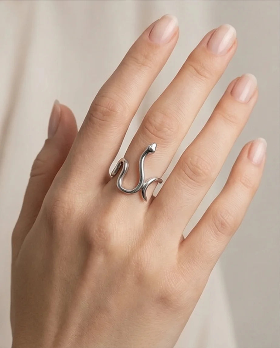 Silver Coil: Sleek Sculptural Serpentine Ring