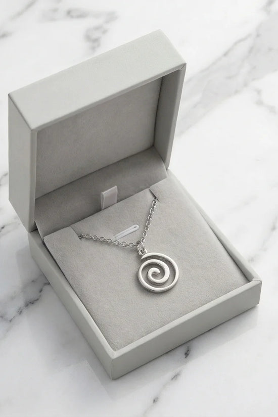 The Silver Vortex: Minimalist Spiral Pendant