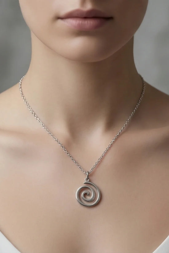 The Silver Vortex: Minimalist Spiral Pendant