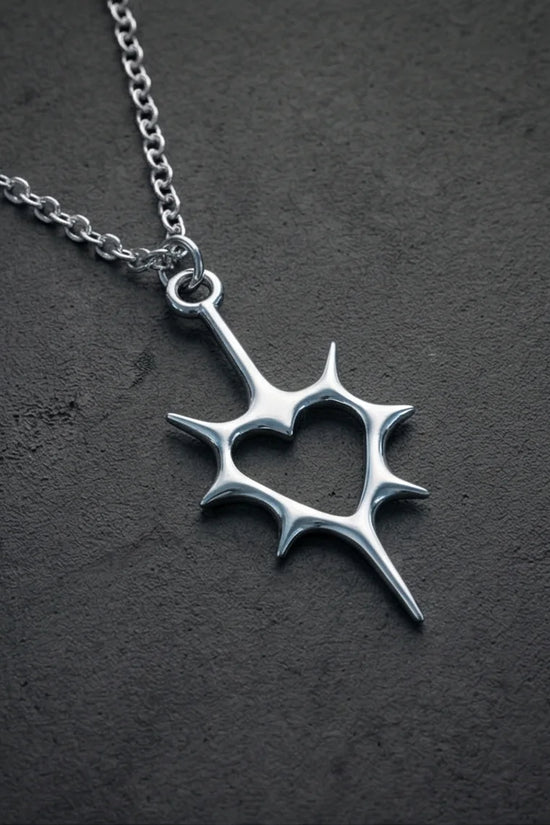 The Thorned Aura: Spiky Heart Statement Necklace