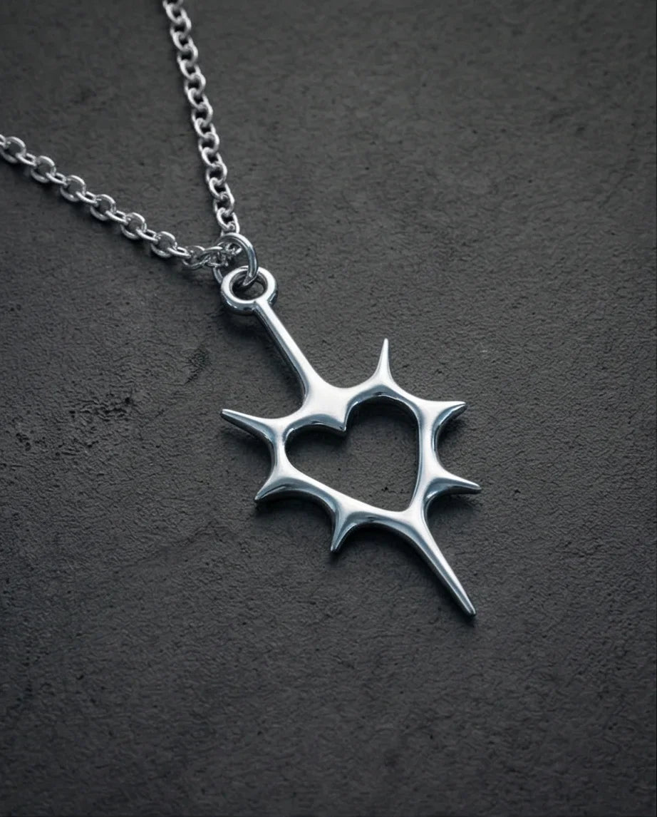 The Thorned Aura: Spiky Heart Statement Necklace