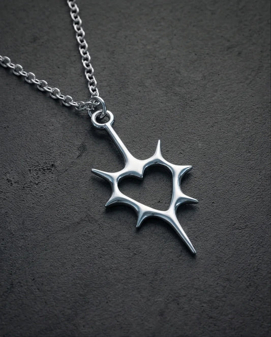 The Thorned Aura: Spiky Heart Statement Necklace