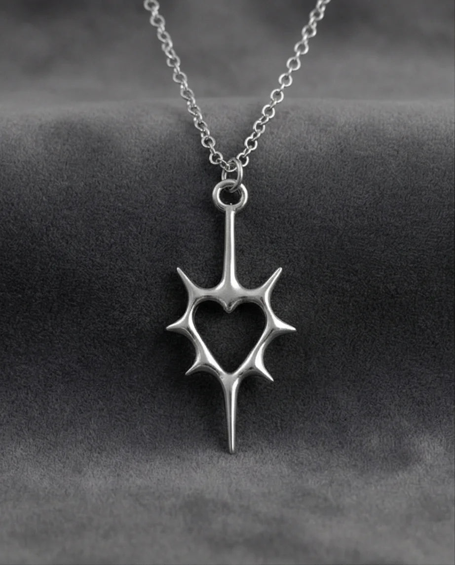 The Thorned Aura: Spiky Heart Statement Necklace