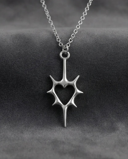 The Thorned Aura: Spiky Heart Statement Necklace