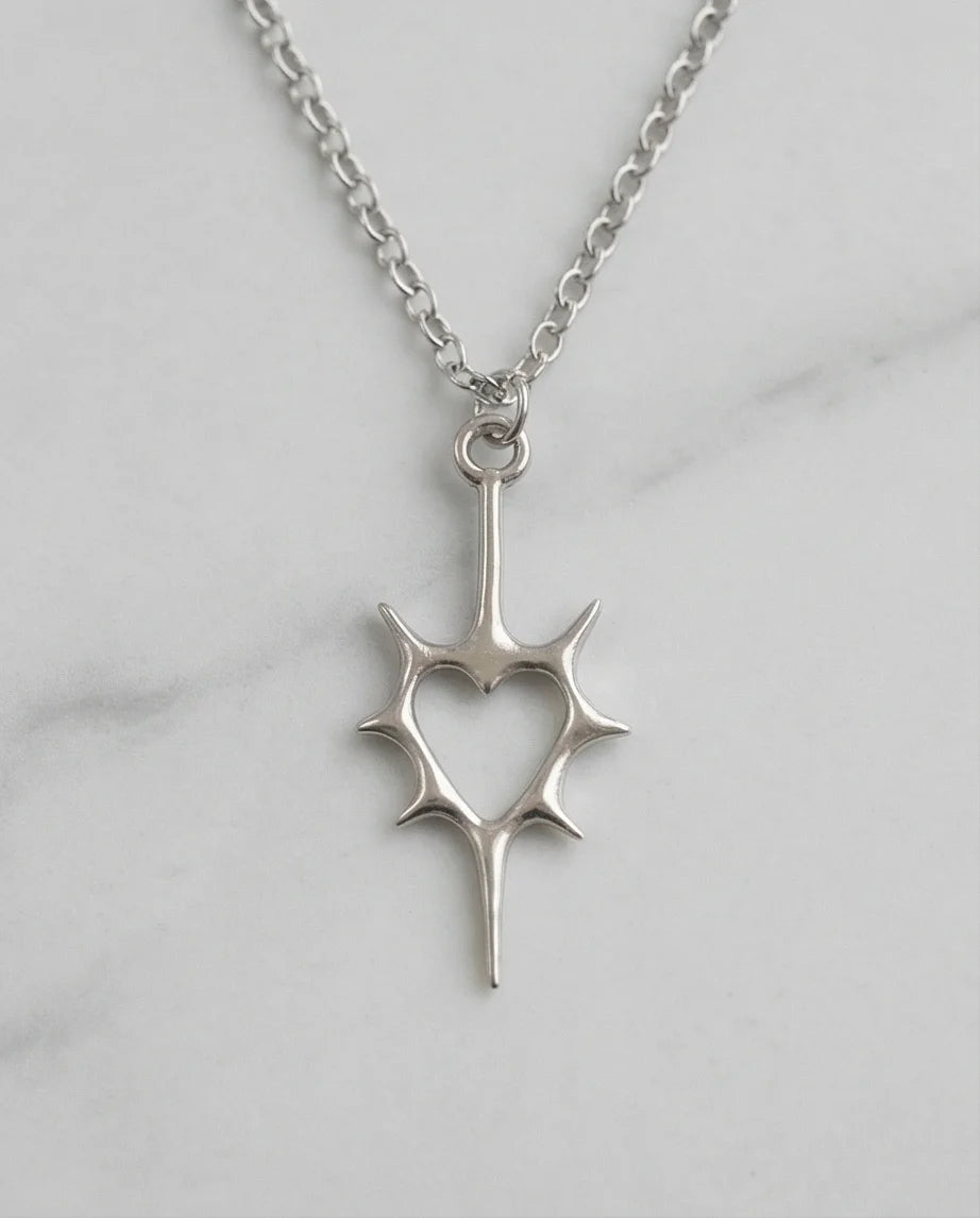 The Thorned Aura: Spiky Heart Statement Necklace