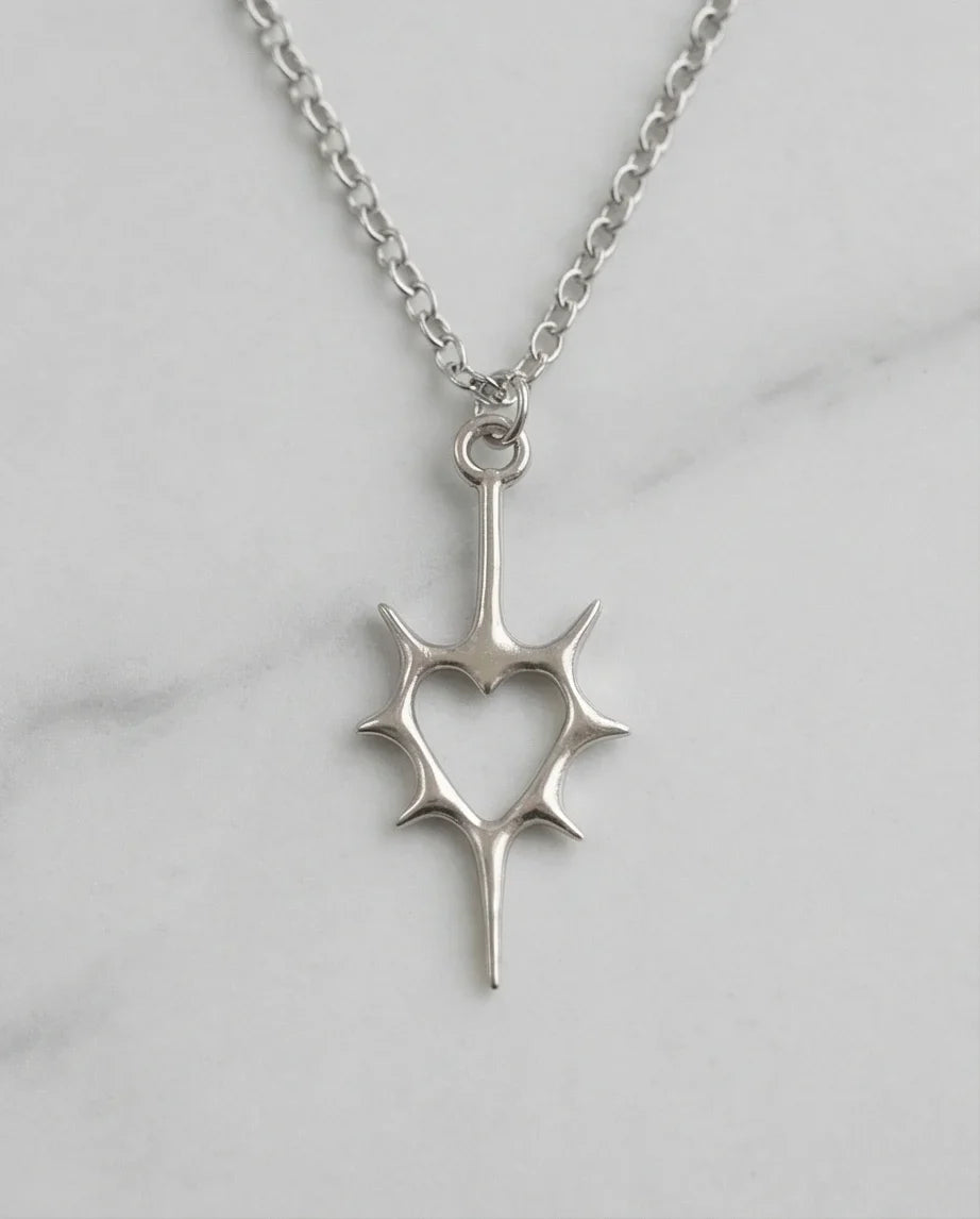 The Thorned Aura: Spiky Heart Statement Necklace