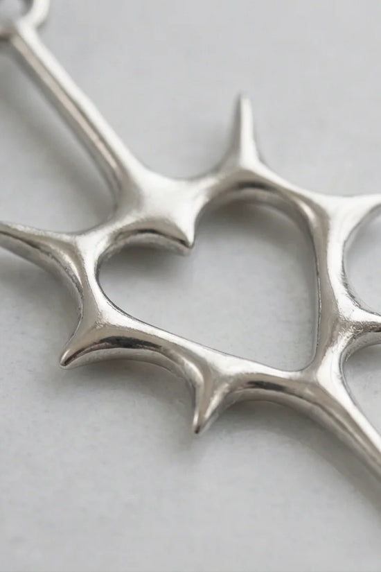 The Thorned Aura: Spiky Heart Statement Necklace