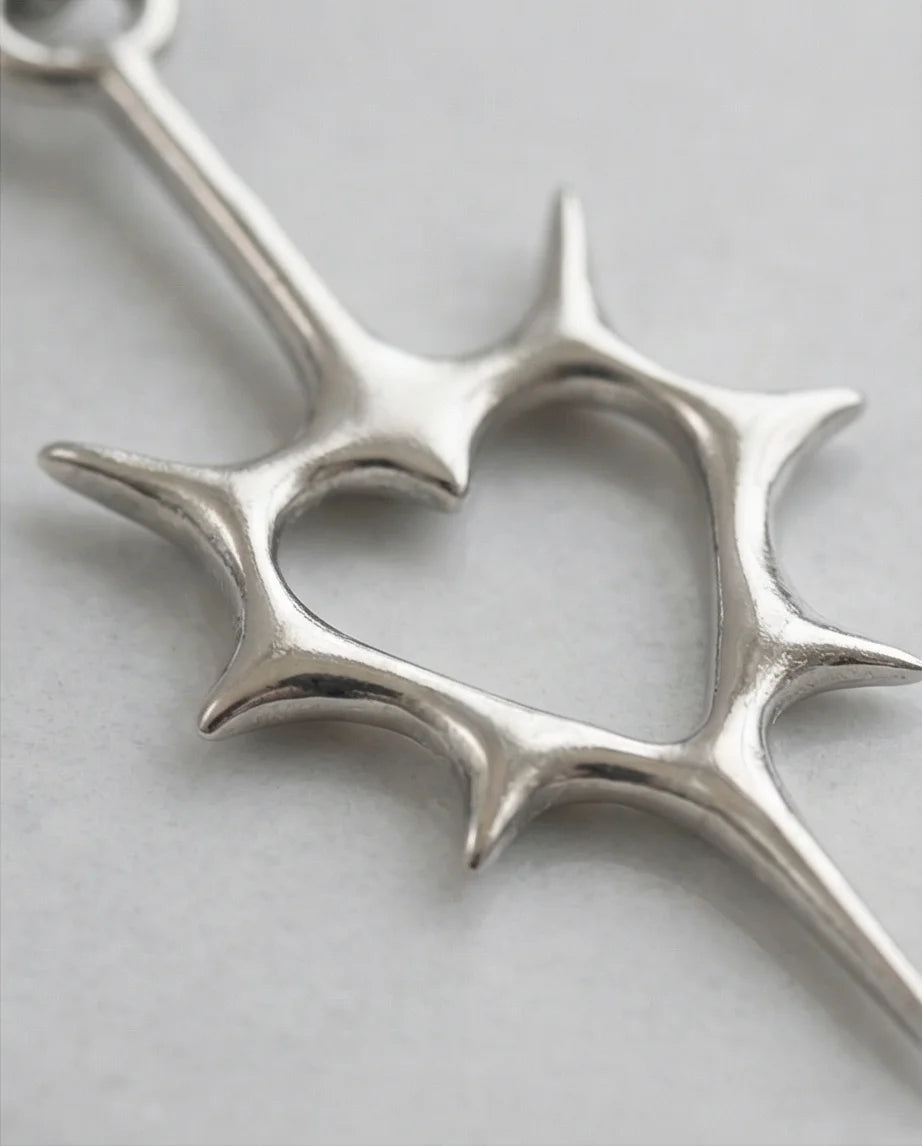 The Thorned Aura: Spiky Heart Statement Necklace