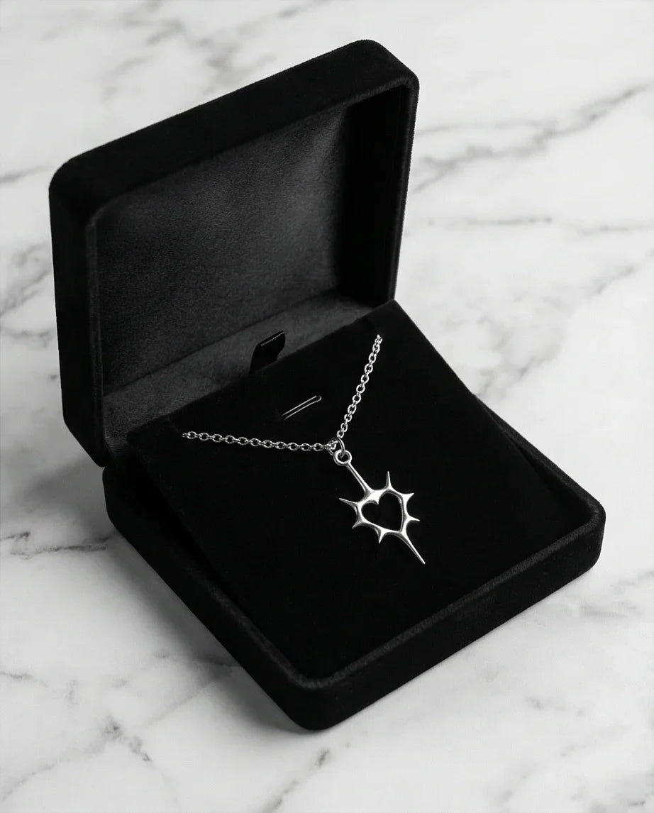 The Thorned Aura: Spiky Heart Statement Necklace