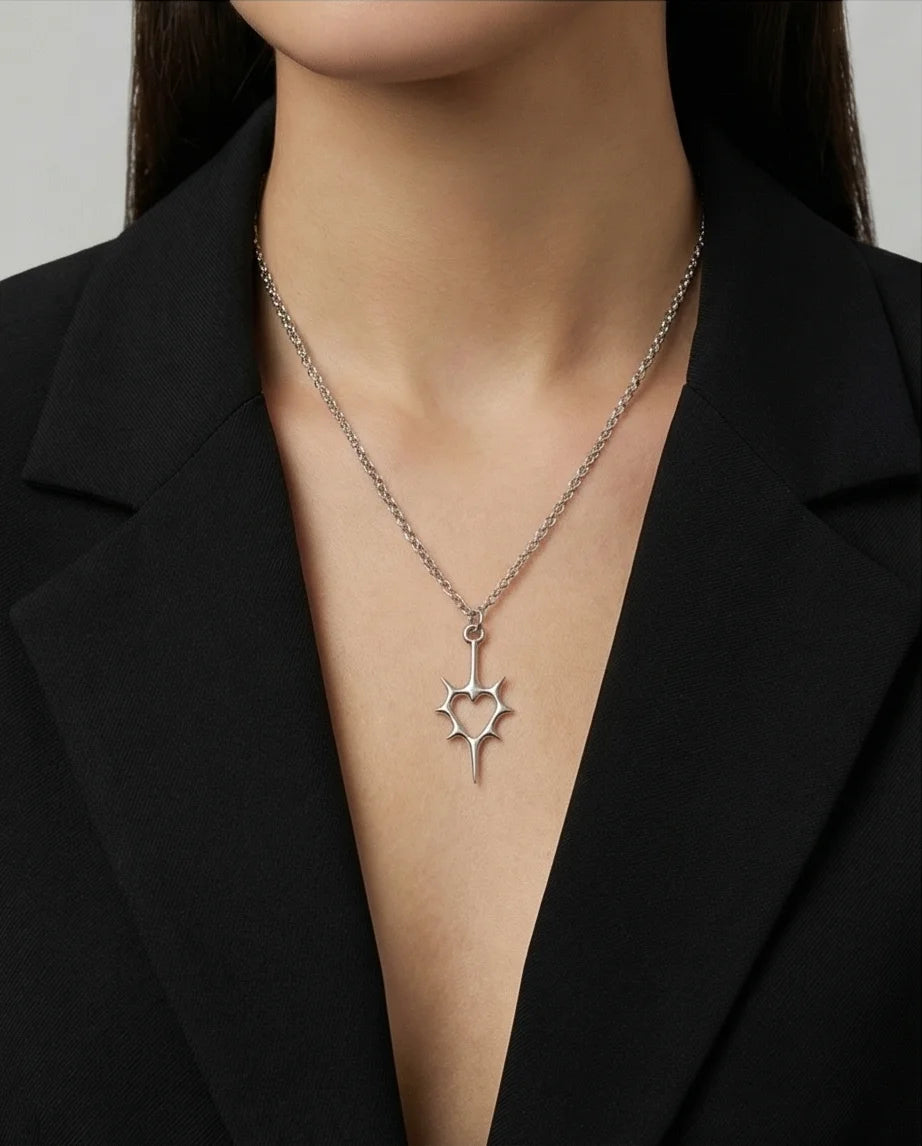 The Thorned Aura: Spiky Heart Statement Necklace