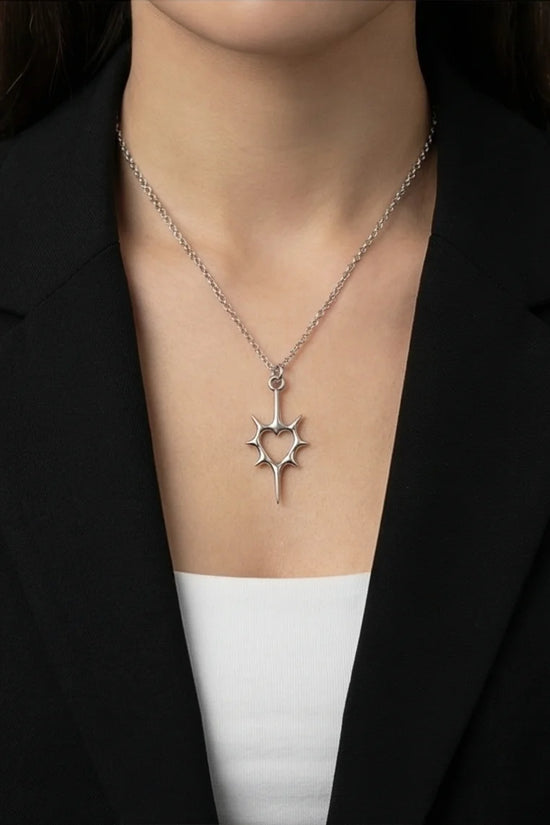 The Thorned Aura: Spiky Heart Statement Necklace