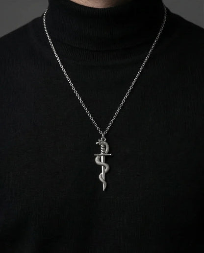The Serpentine Blade: Antique Silver Guardian Necklace