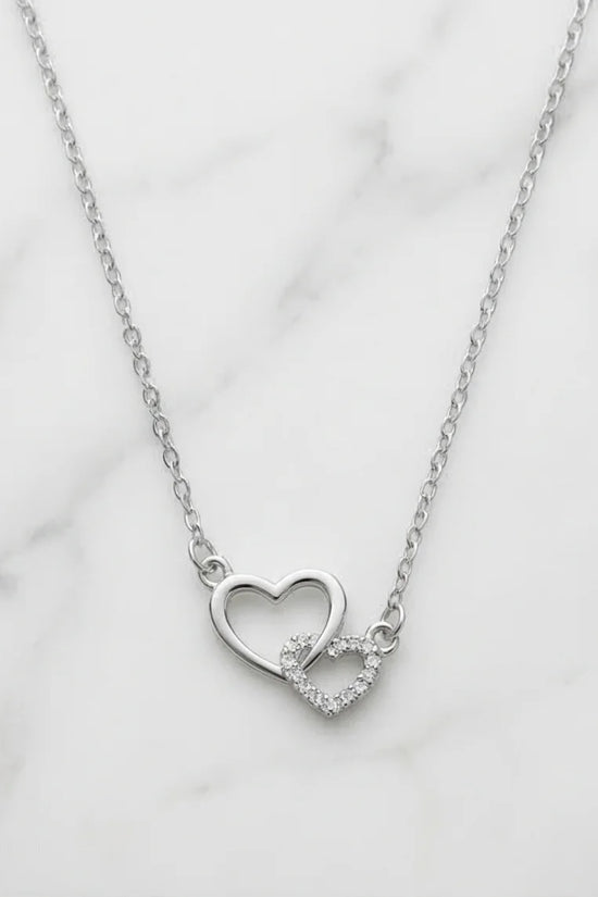 The Eternal Bond: Interlocking Heart Necklace