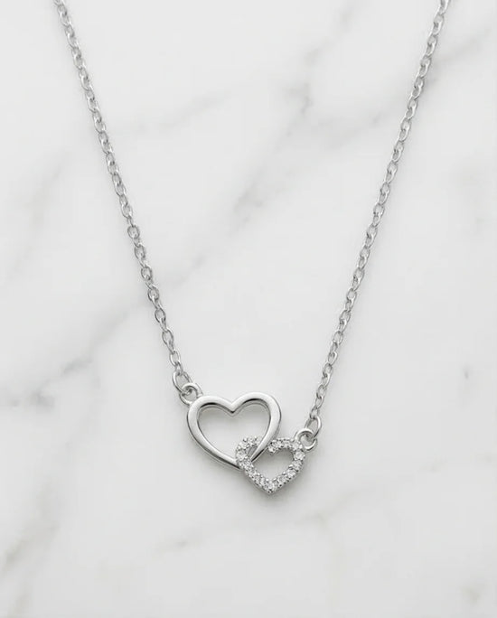 The Eternal Bond: Interlocking Heart Necklace