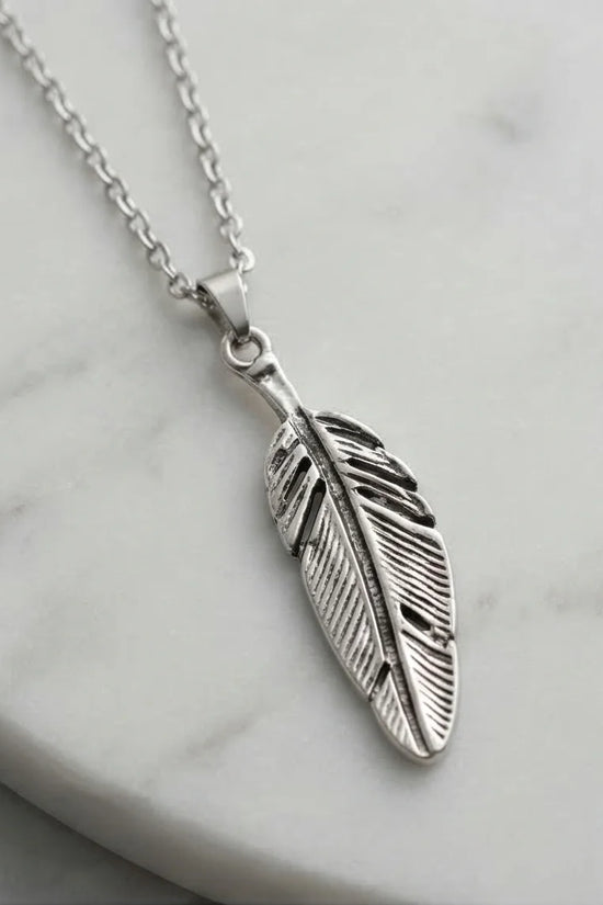 The Guardian Plume: Detailed Antique Silver Feather Necklace