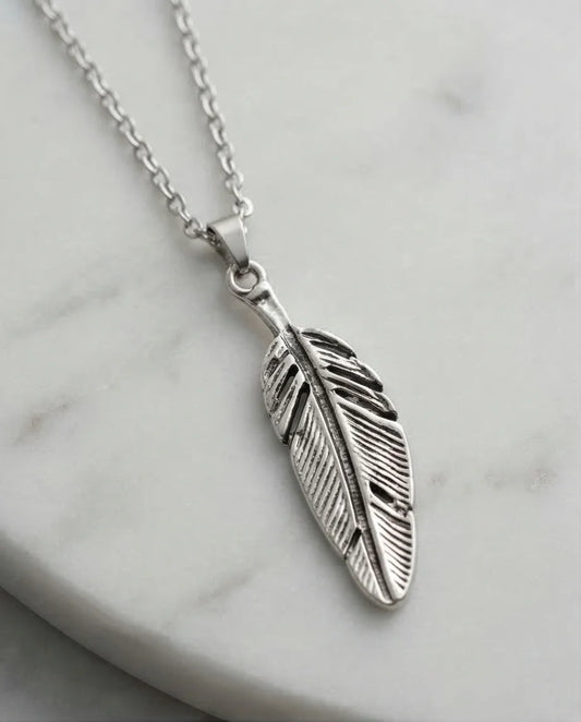 The Guardian Plume: Detailed Antique Silver Feather Necklace