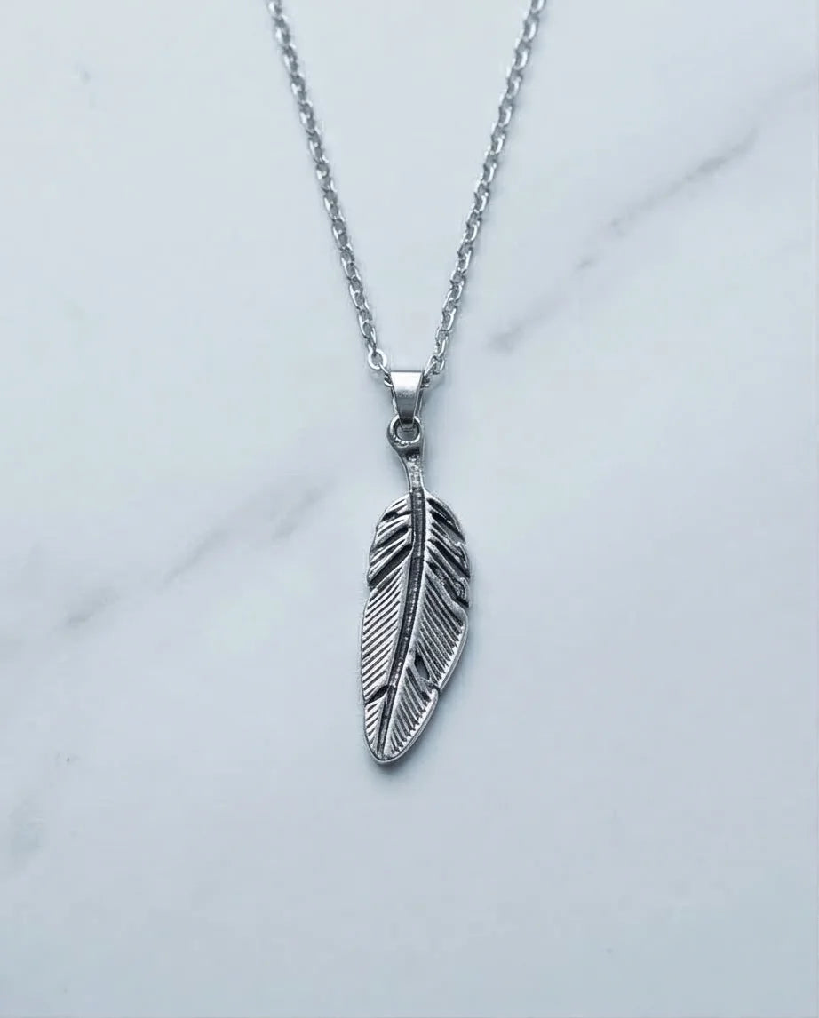 The Guardian Plume: Detailed Antique Silver Feather Necklace