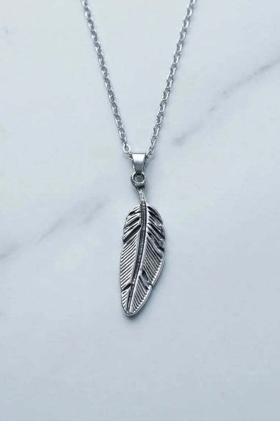 The Guardian Plume: Detailed Antique Silver Feather Necklace