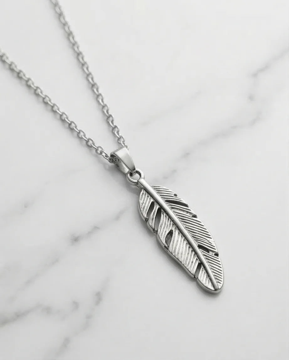 The Guardian Plume: Detailed Antique Silver Feather Necklace