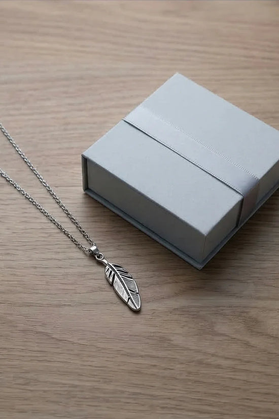 The Guardian Plume: Detailed Antique Silver Feather Necklace