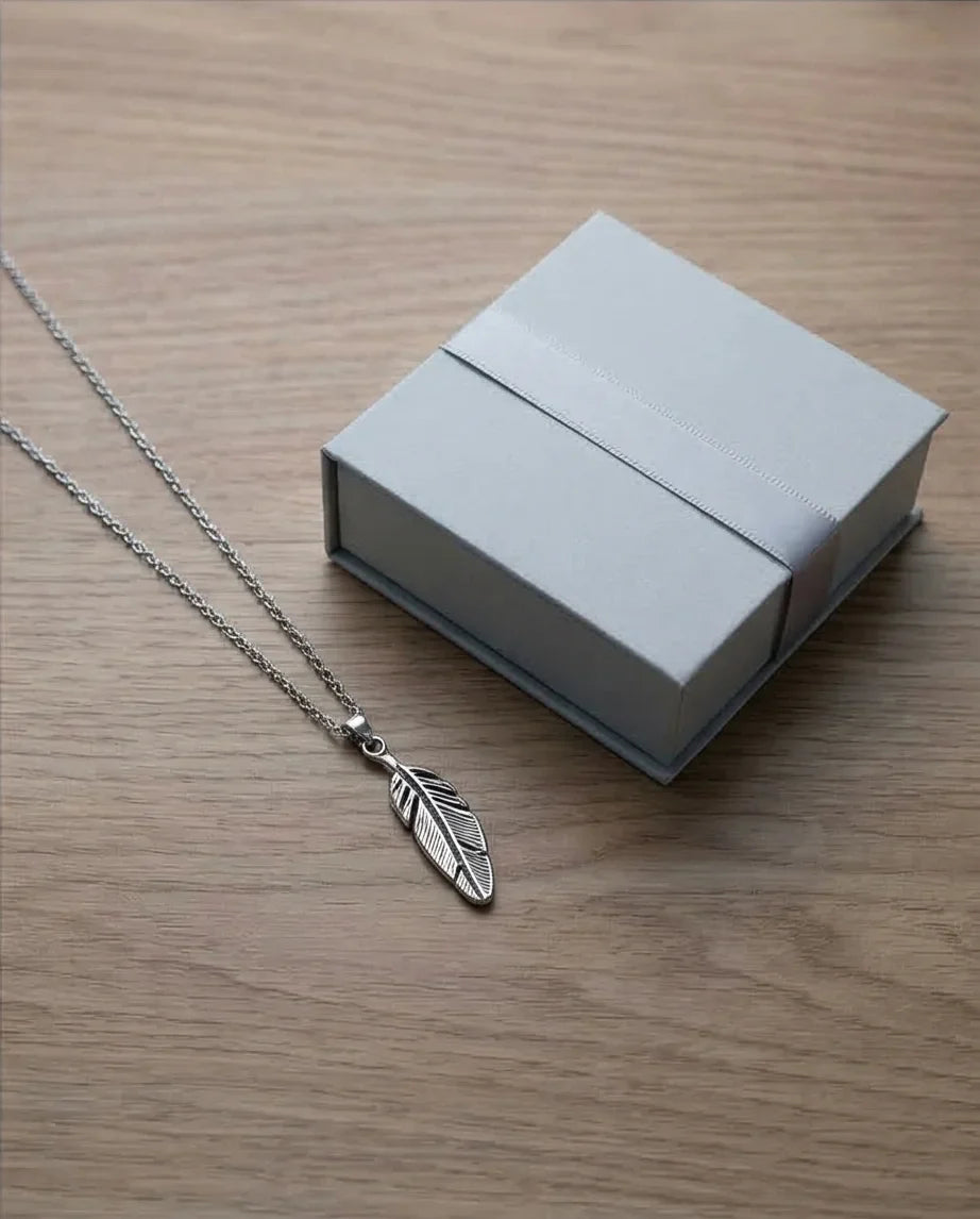 The Guardian Plume: Detailed Antique Silver Feather Necklace