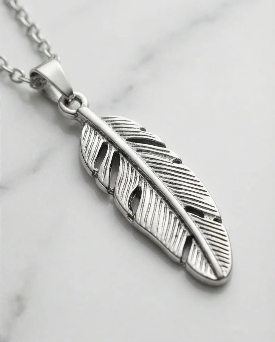 The Guardian Plume: Detailed Antique Silver Feather Necklace