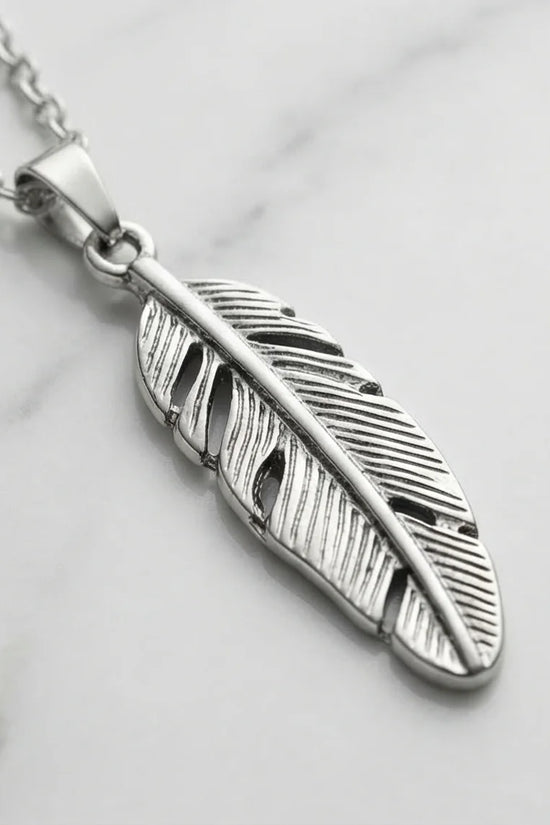 The Guardian Plume: Detailed Antique Silver Feather Necklace