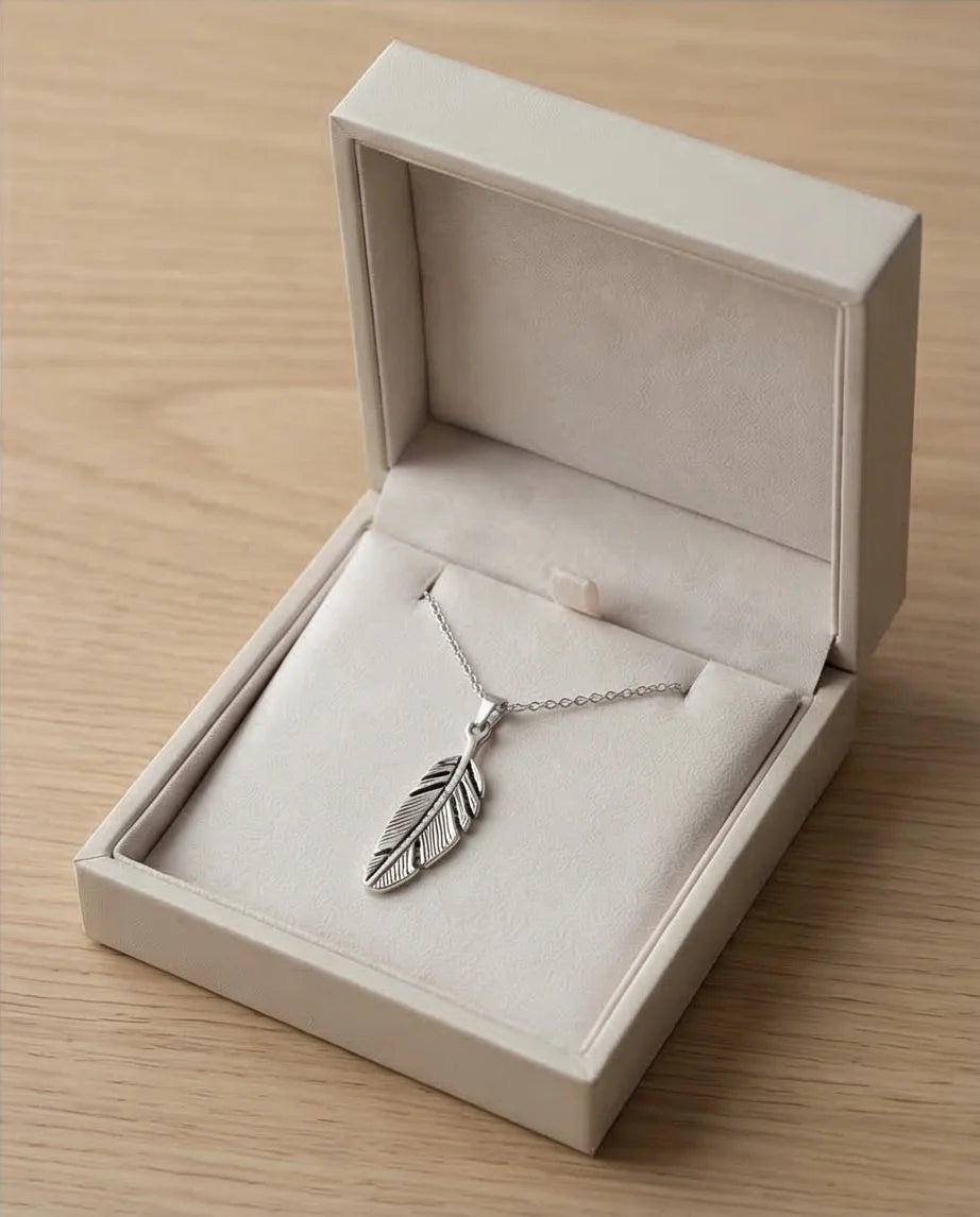 The Guardian Plume: Detailed Antique Silver Feather Necklace