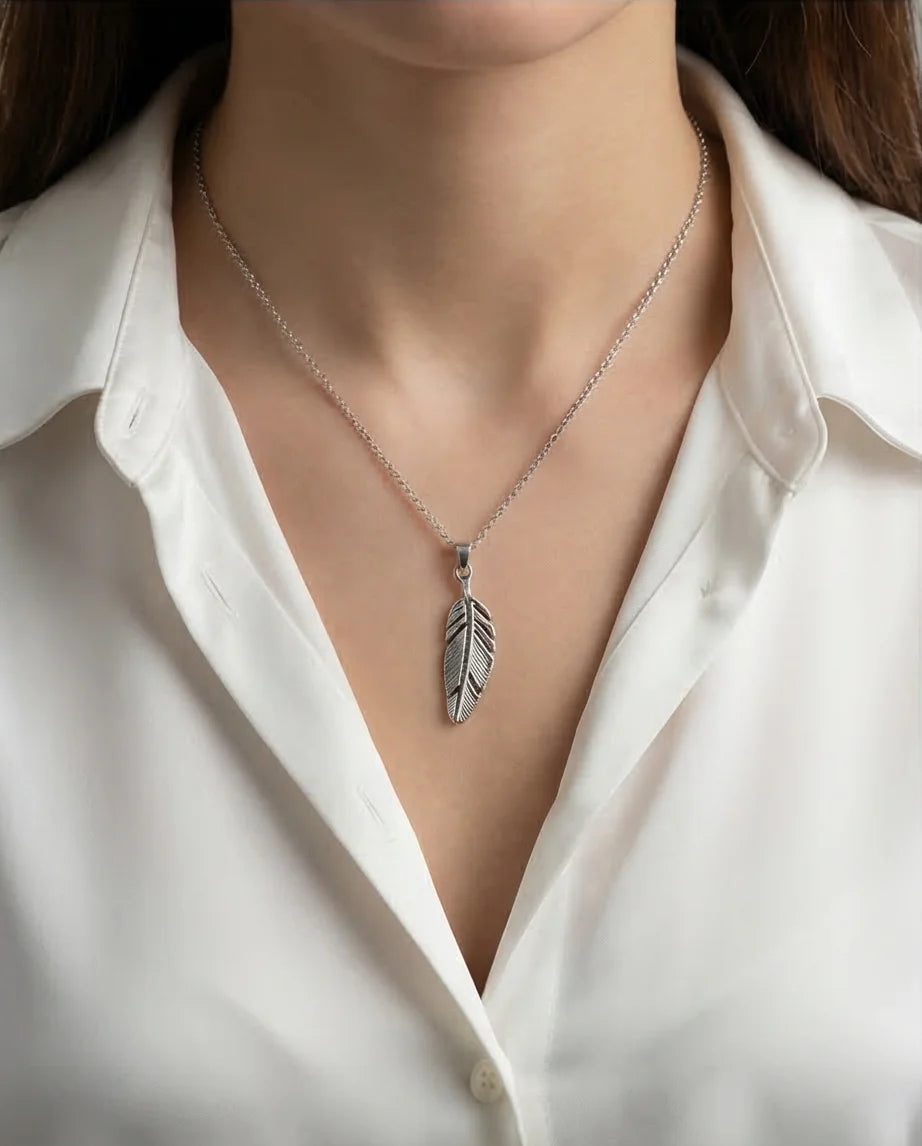 The Guardian Plume: Detailed Antique Silver Feather Necklace