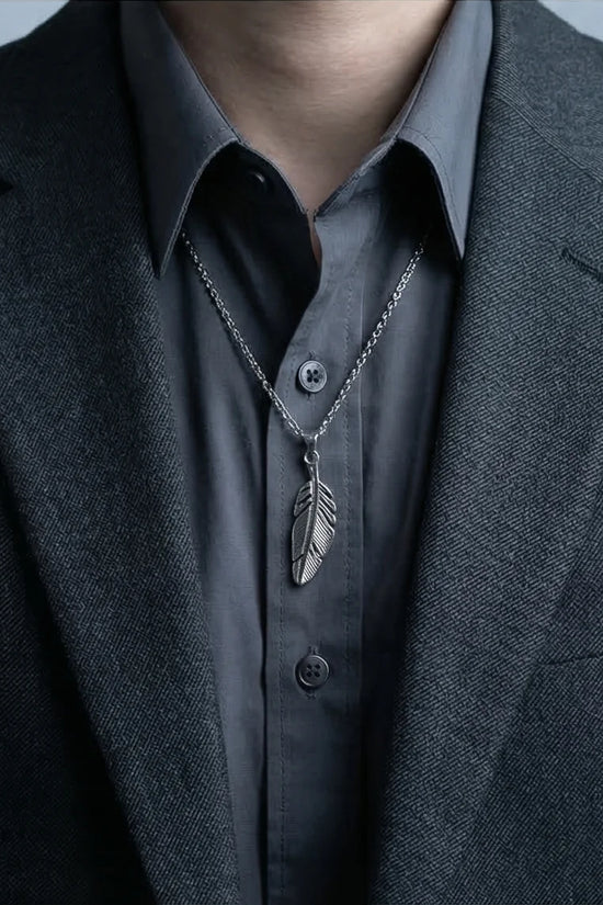 The Guardian Plume: Detailed Antique Silver Feather Necklace