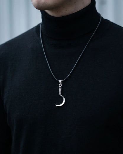 The Reaper's Crescent: Gothic Skull Sickle Pendant Necklace