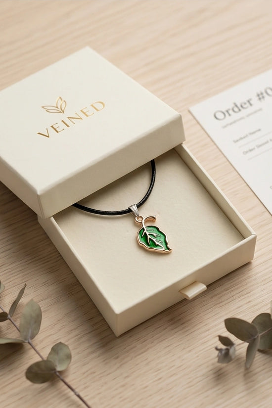 Gold and Green Leaf Pendant Necklace