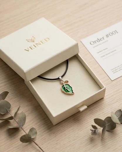 Gold and Green Leaf Pendant Necklace