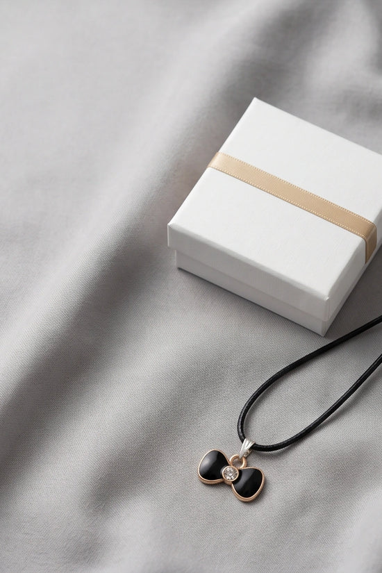 Gold Crystal and Black Bow Necklace