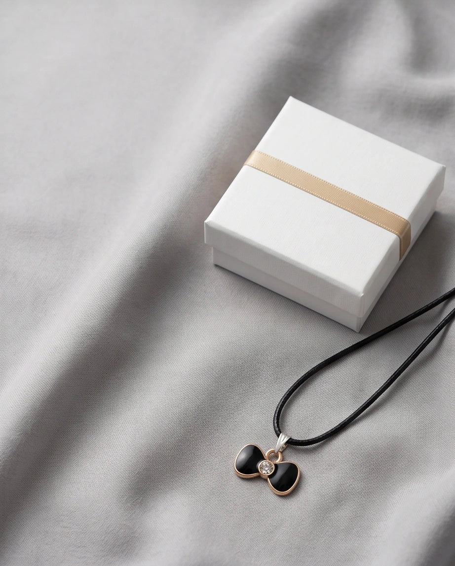 Gold Crystal and Black Bow Necklace