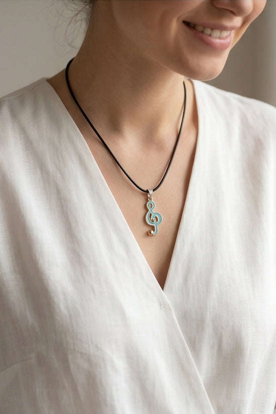 Gold and Light Blue Treble Clef Necklace