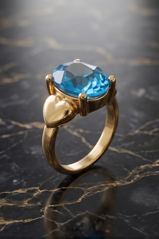 Gold Plated Sky Blue Topaz Oval Heart Accent Ring