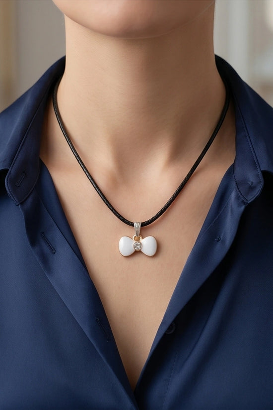 Gold and White Bow Tie Pendant Necklace