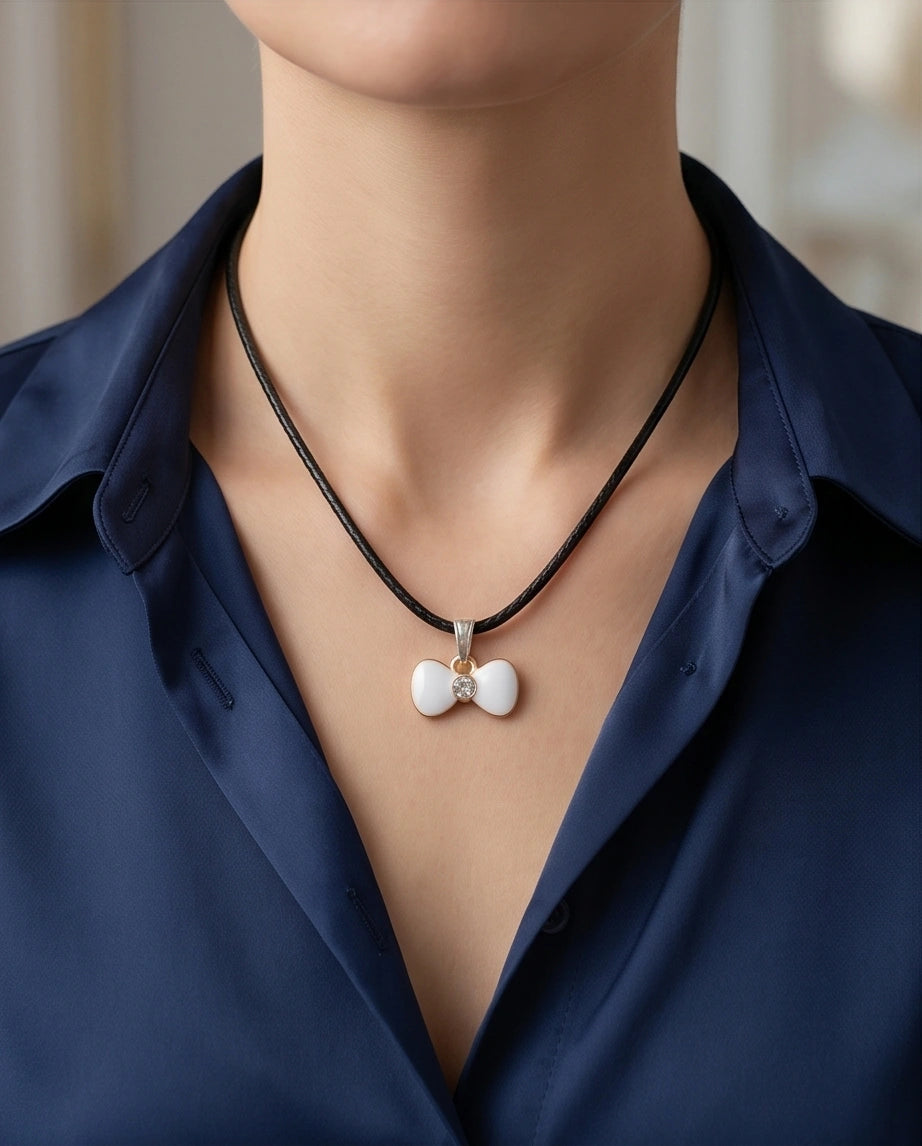 Gold and White Bow Tie Pendant Necklace