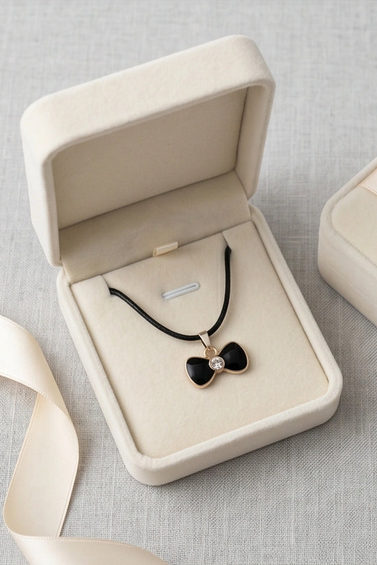 Gold Crystal and Black Bow Necklace