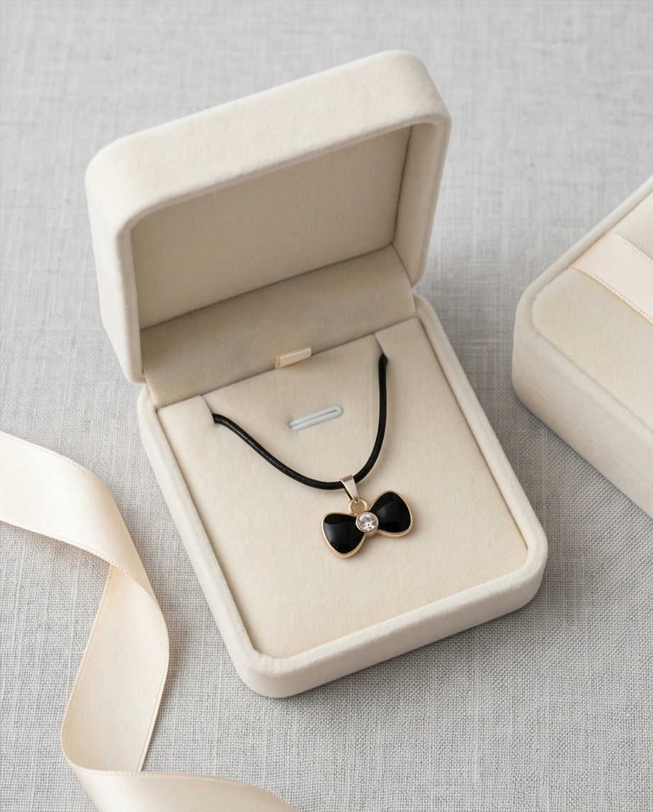 Gold Crystal and Black Bow Necklace