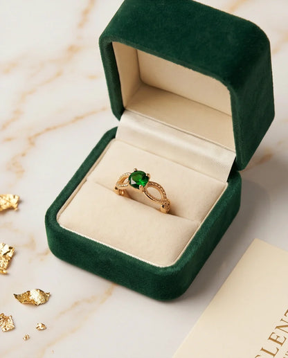 Gold Emerald Round Infinity Twist Ring