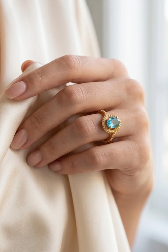 Luxury 14K Gold Oval Swiss Blue Topaz Swirl Halo Ring