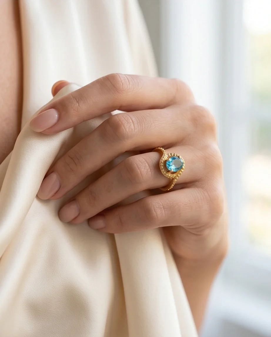 Luxury Gold Oval Swiss Blue Topaz Swirl Halo Ring
