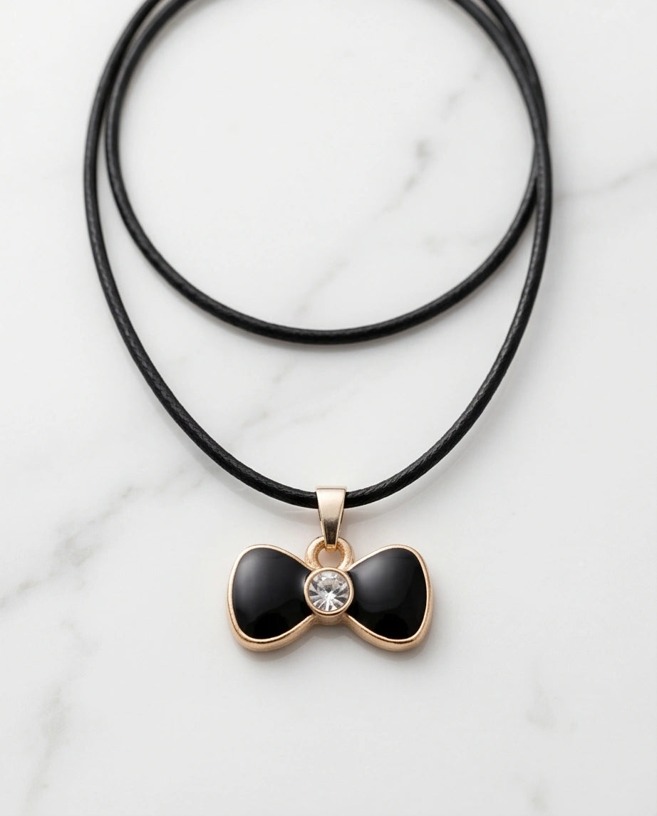 Gold Crystal and Black Bow Necklace