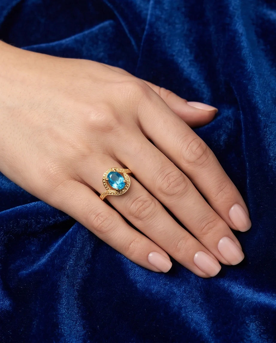 Luxury Gold Oval Swiss Blue Topaz Swirl Halo Ring