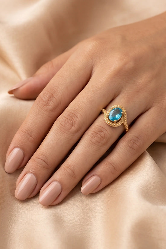 Luxury 14K Gold Oval Swiss Blue Topaz Swirl Halo Ring