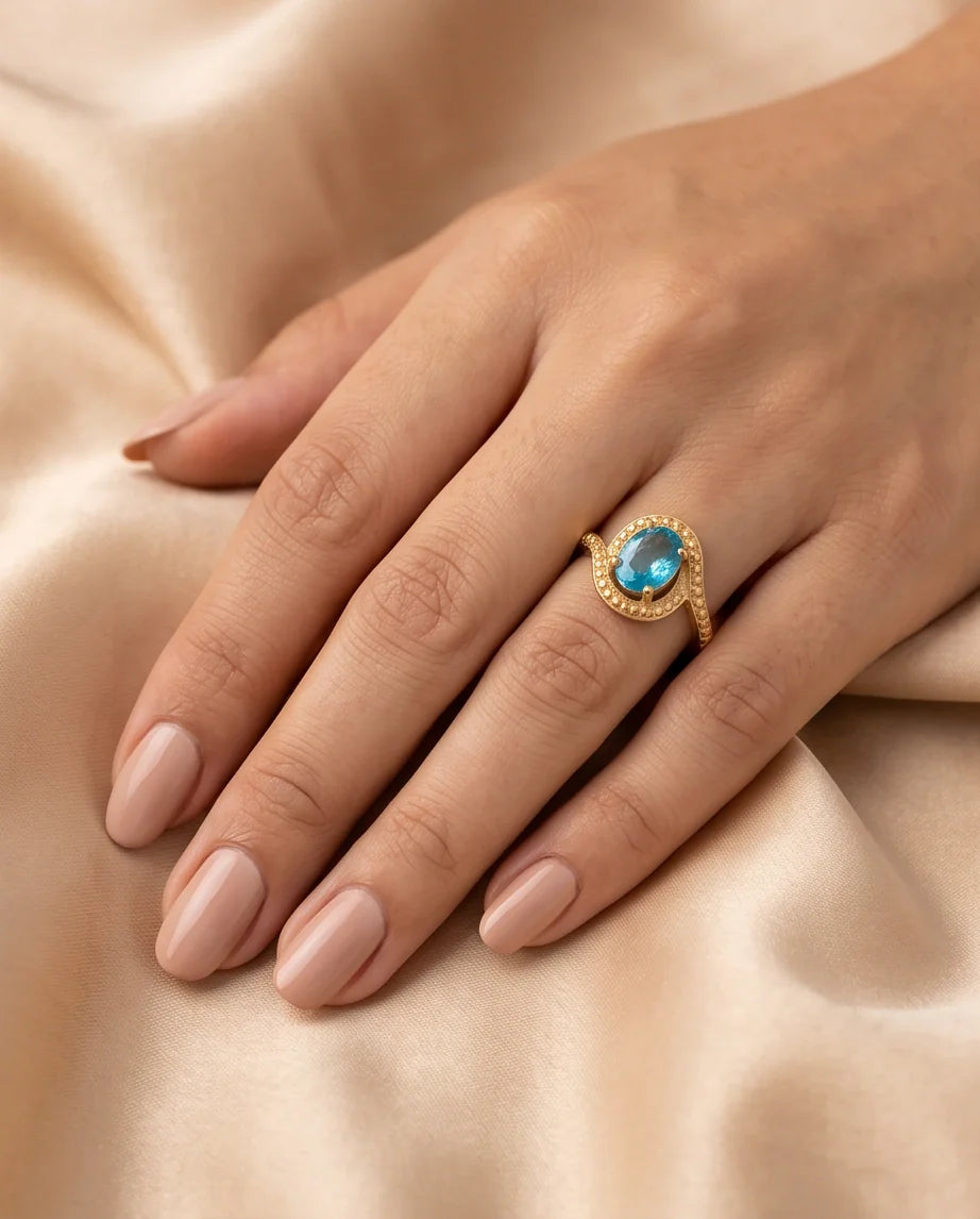 Luxury Gold Oval Swiss Blue Topaz Swirl Halo Ring